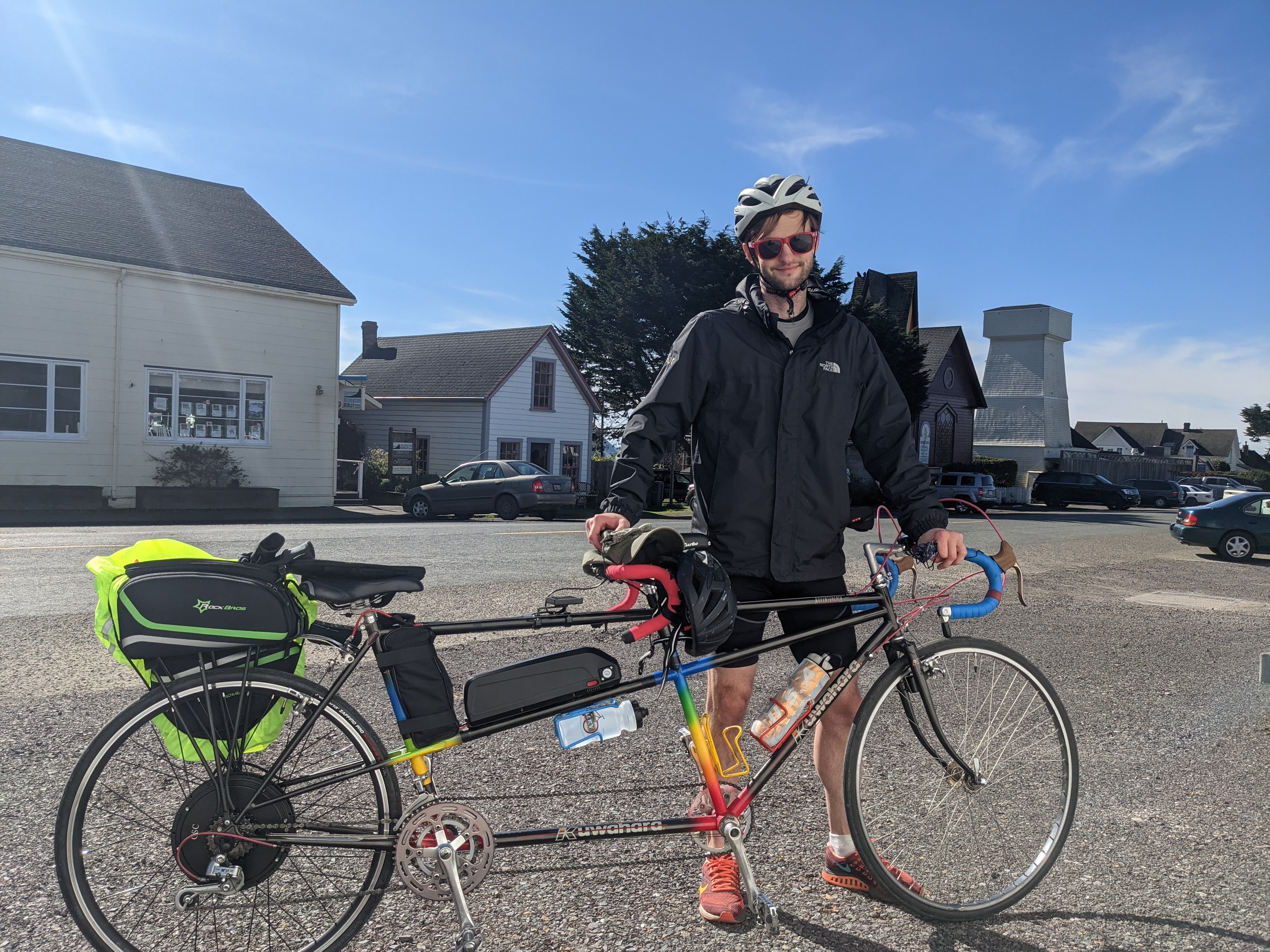 me holding my tandem ebike