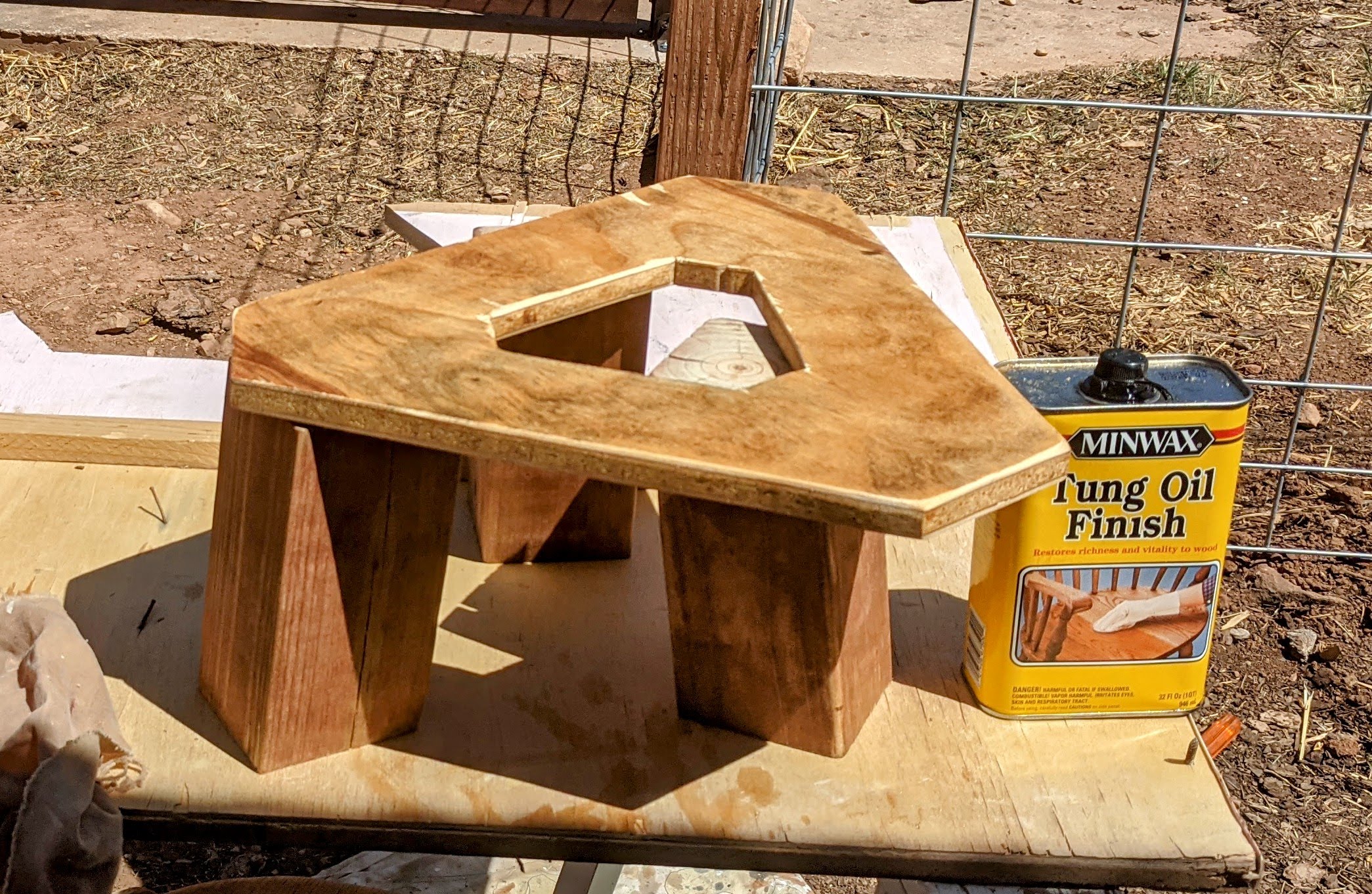 wood with tung oil can next to it