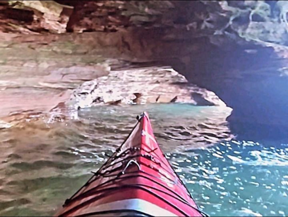 A map comparing train travel times to Bayfield in 1900 with bus travel times in 2024, and photos of kayaking the Apostle Islands